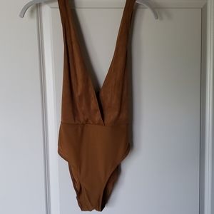 Strappy tan suede bodysuit